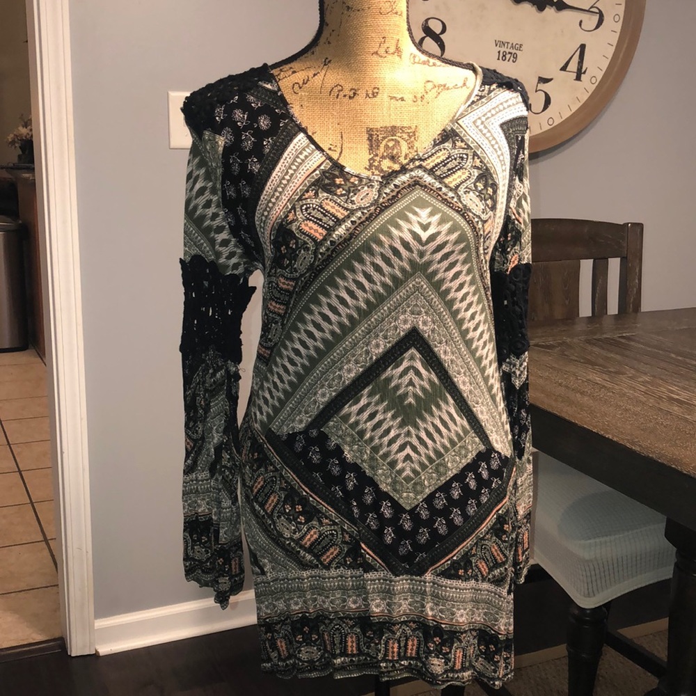 Dark green mini dress. Long sleeve with crochet detail. Like new.